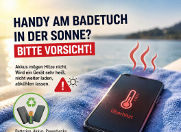 Handy am Badetuch zeigt Überhitzung auf