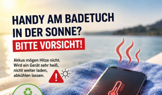 Handy am Badetuch zeigt Überhitzung auf